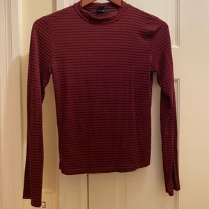 red and blue striped mock neck shirt